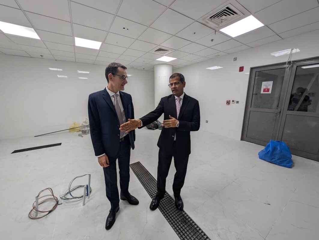 Sakthivel Jayaraman, director of engineering at the Crowne Plaza Doha, shows Gilles Nicolas, area general manager, plans for the hotel's new recycling plant. 
