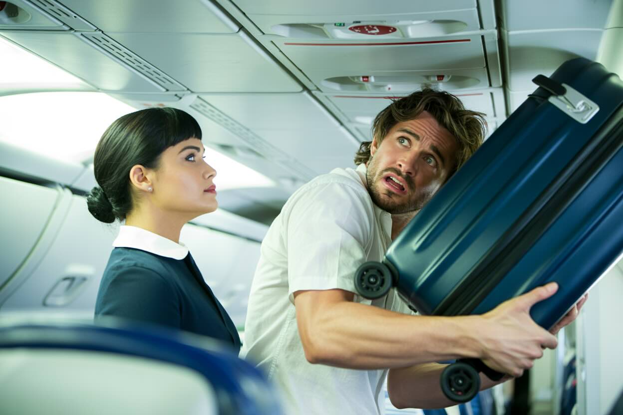 A fragile medical device. An overstuffed rollaboard. A large cooler filled with snacks. You'd be shocked by what passengers are trying to fit under their economy class seats these days.
